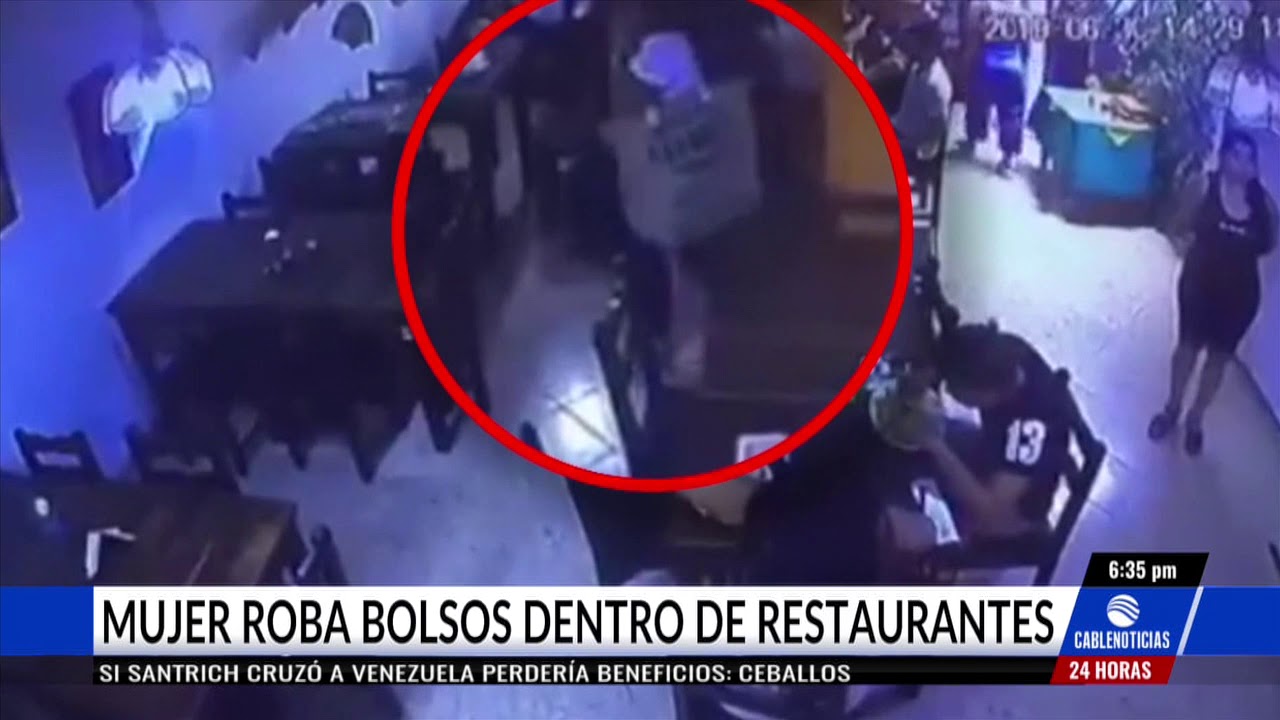 Alerta en Cali por mujer que roba bolsos en restaurantes