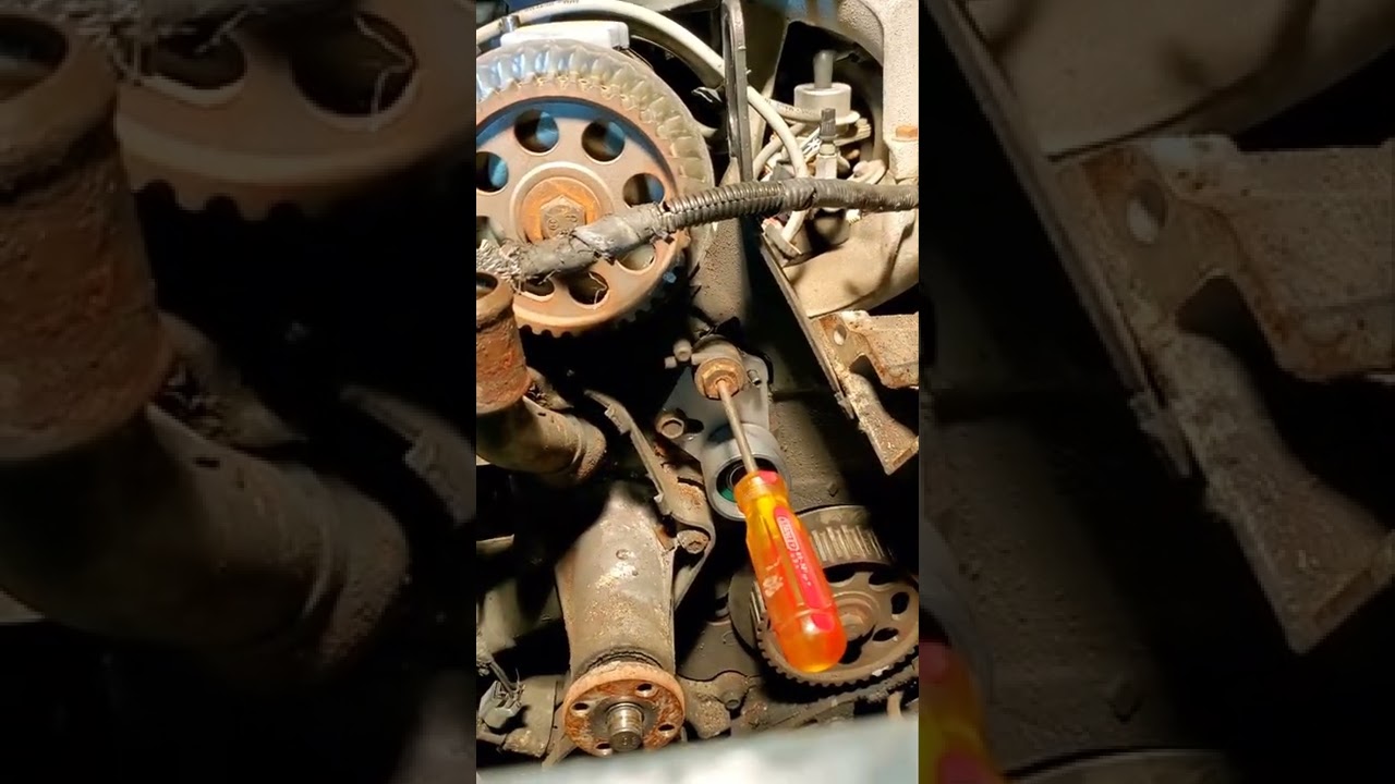 Ford ranger 2.3 timing belt tensioner install ( no special tool required )