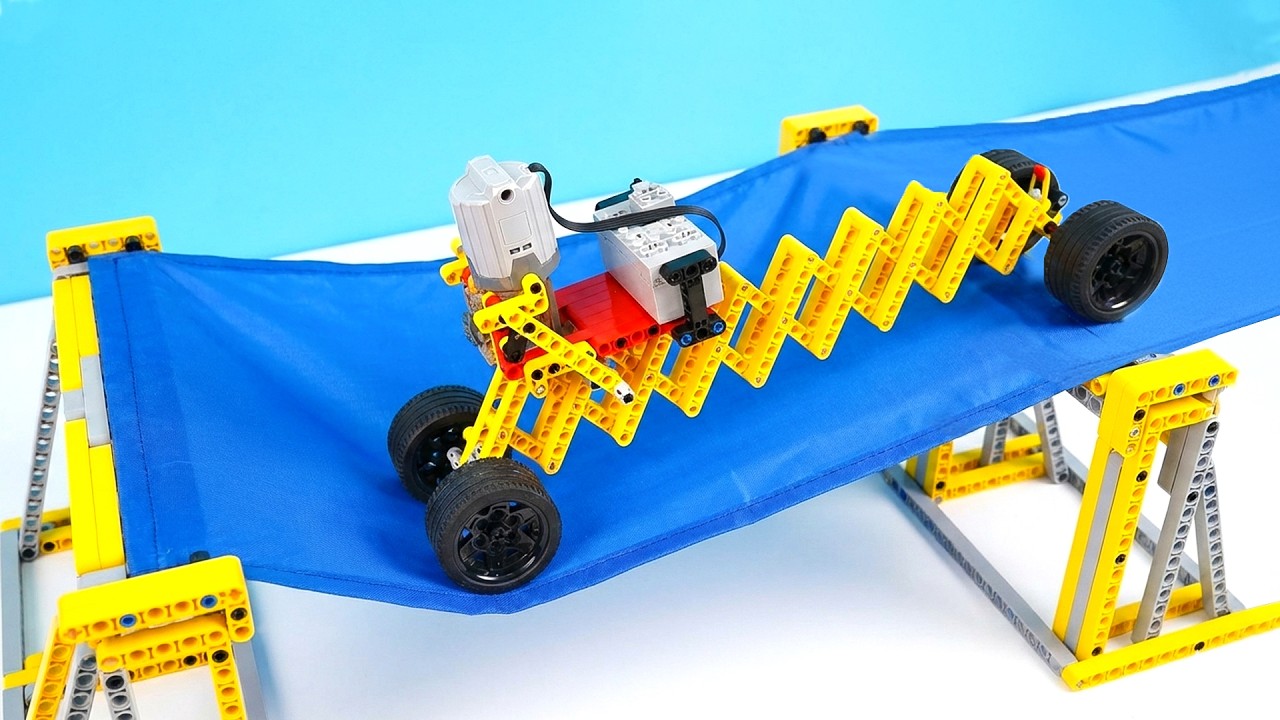 Гибкая машинка LEGO преодолевает скользкую нейлоновую поверхность.