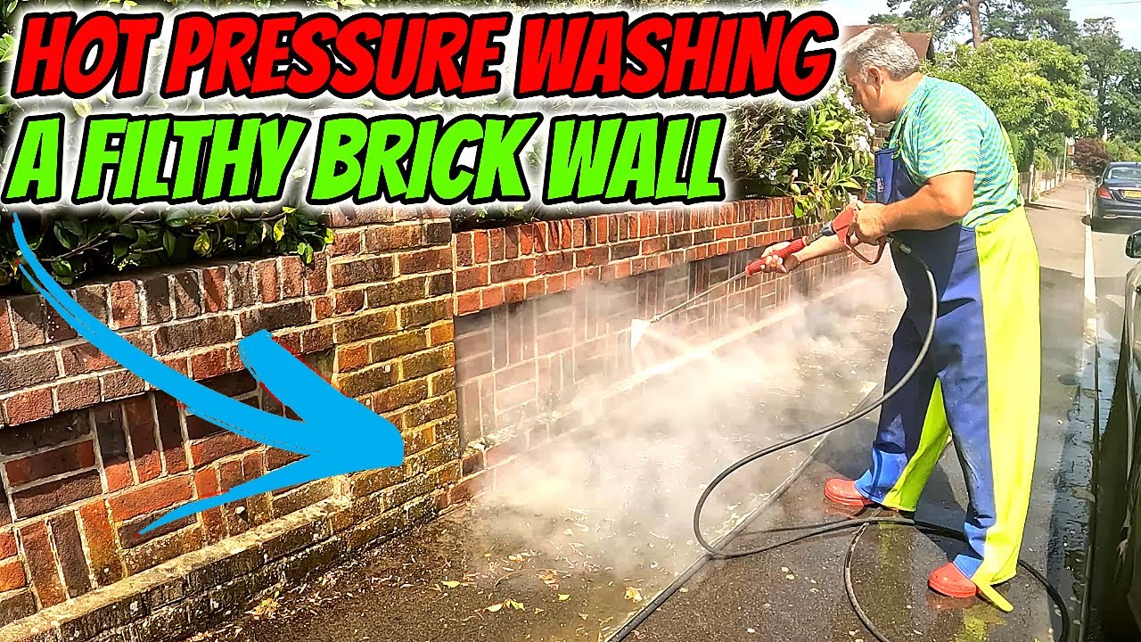 The Satisfying Science of Power Washing a Brick Wall
