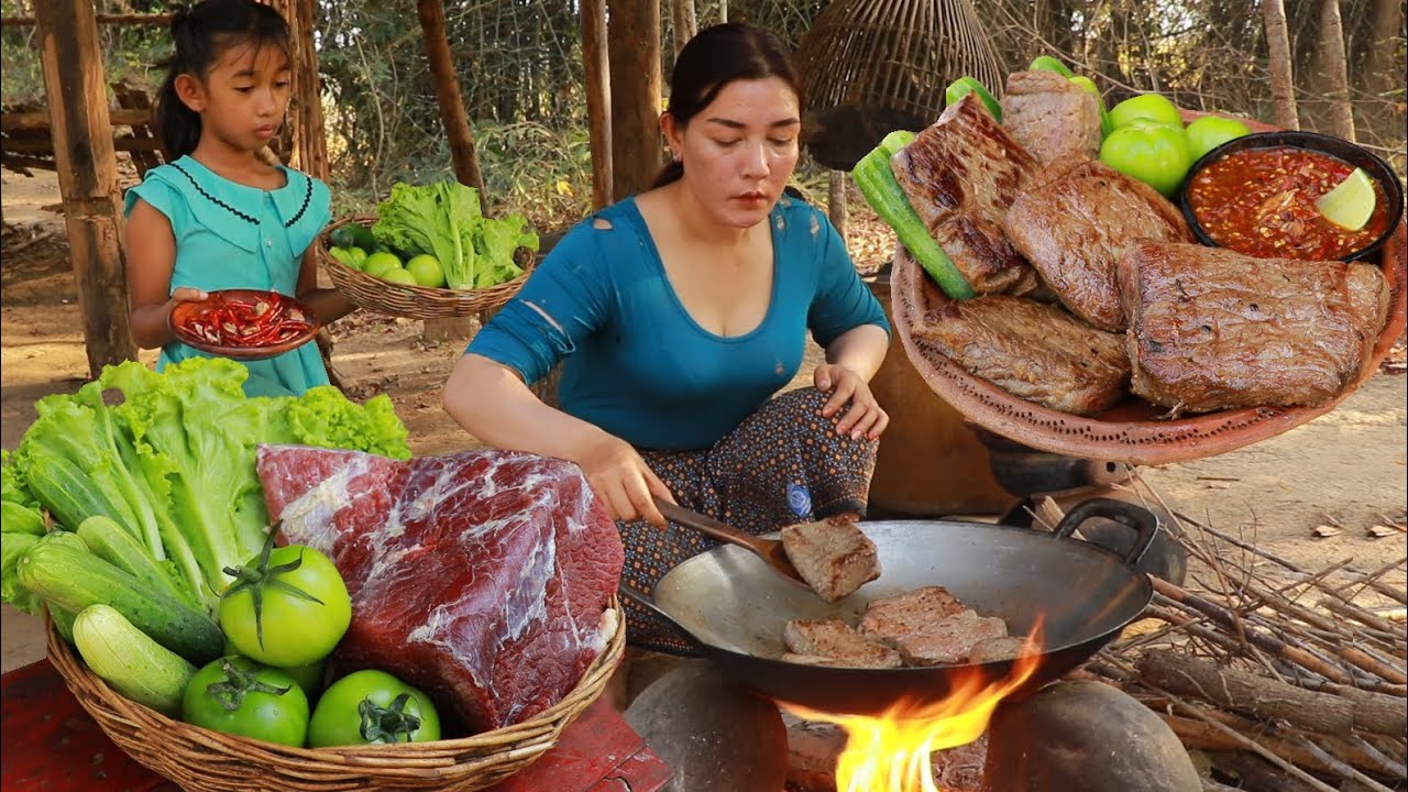 Yummy! Beef steak for tasty delicious- Cooking beef with hot spicy chili sauce for lunch in forest