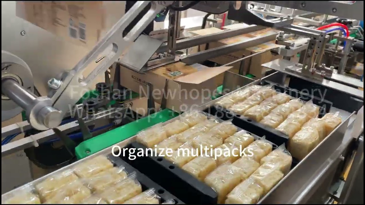 Snack bar secondary packaging solution with cartoning machine