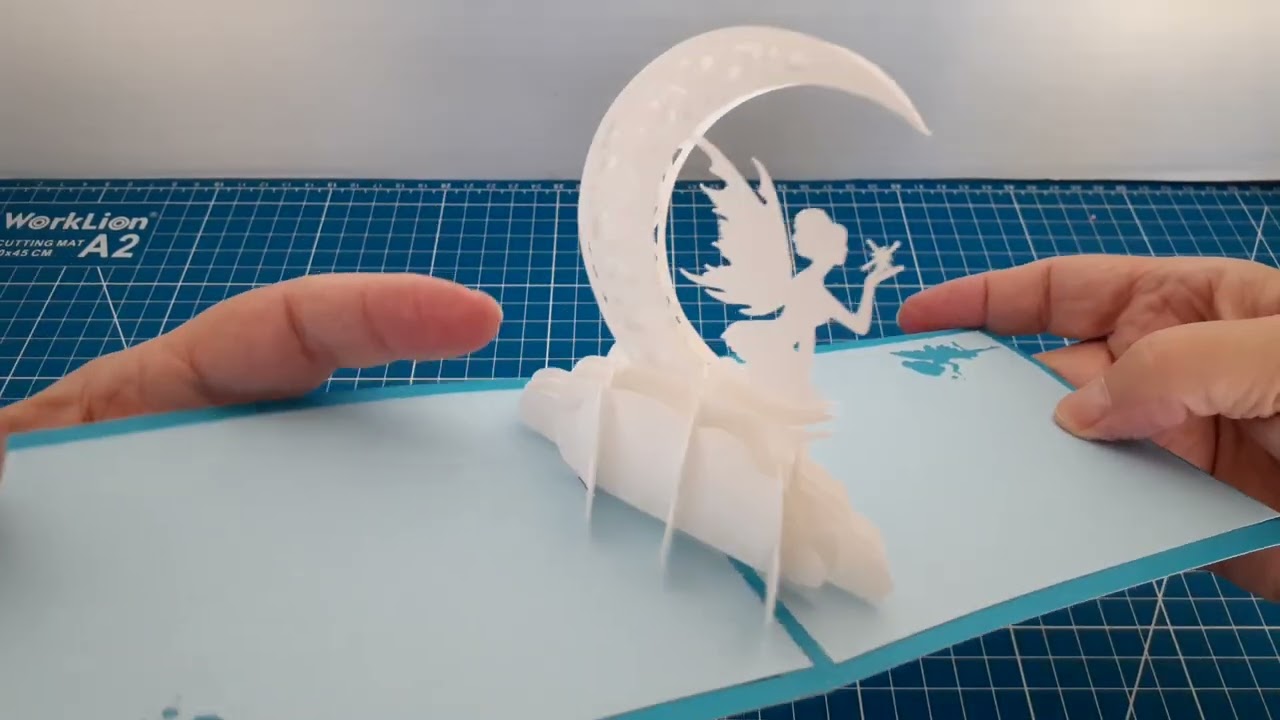 Sliceform-based Pop-up Card with Fairy and Moon on Clouds