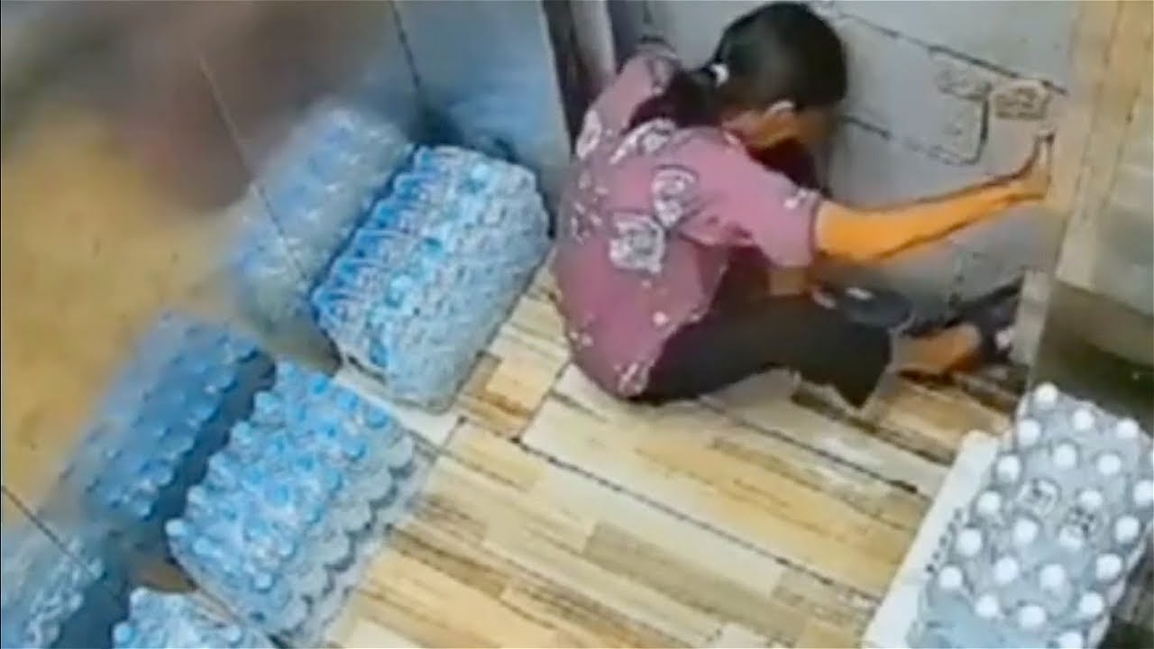 Woman trapped inside an elevator does the unthinkable