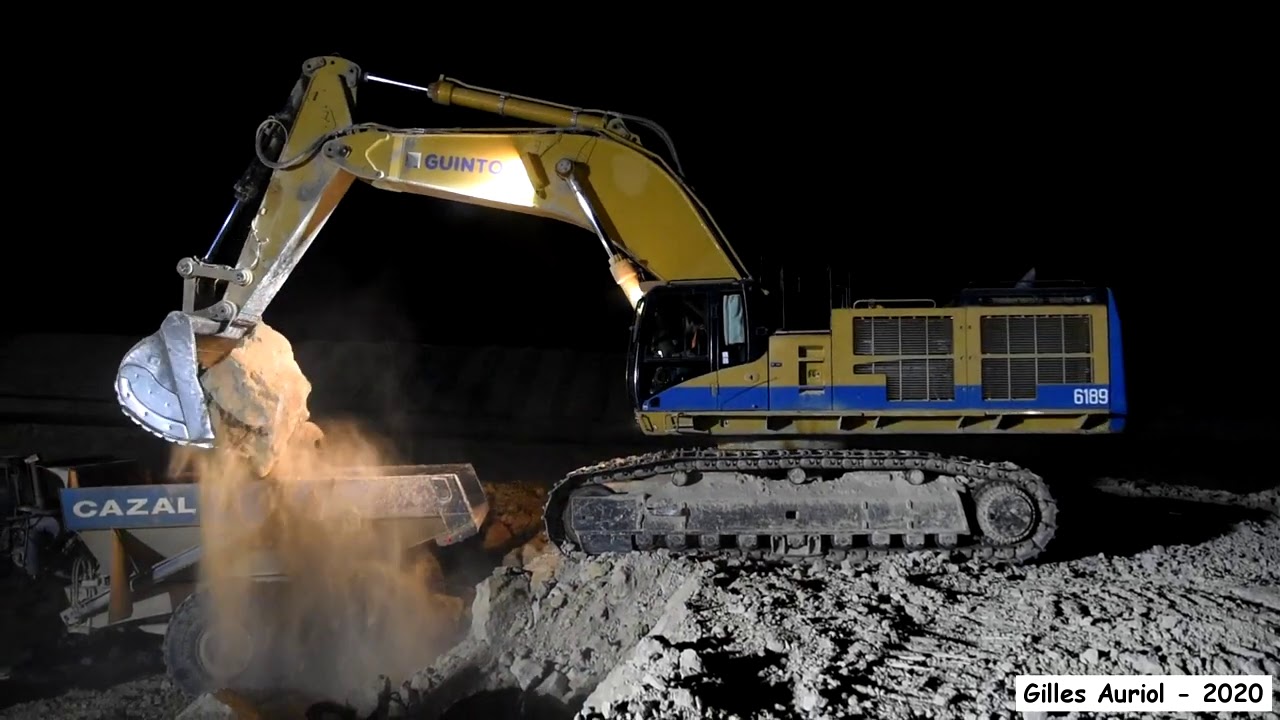 💪 High productivity - Caterpillar 385C laoding 40 tons articulated dump trucks