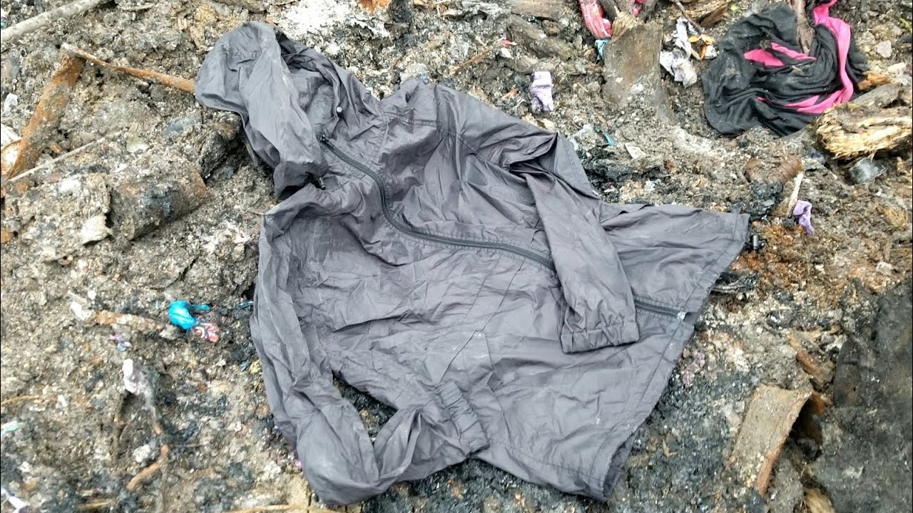 Burning wet nylon windbreaker jacket.