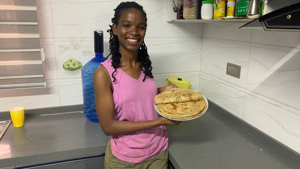 Making chapati and pork stew for myan