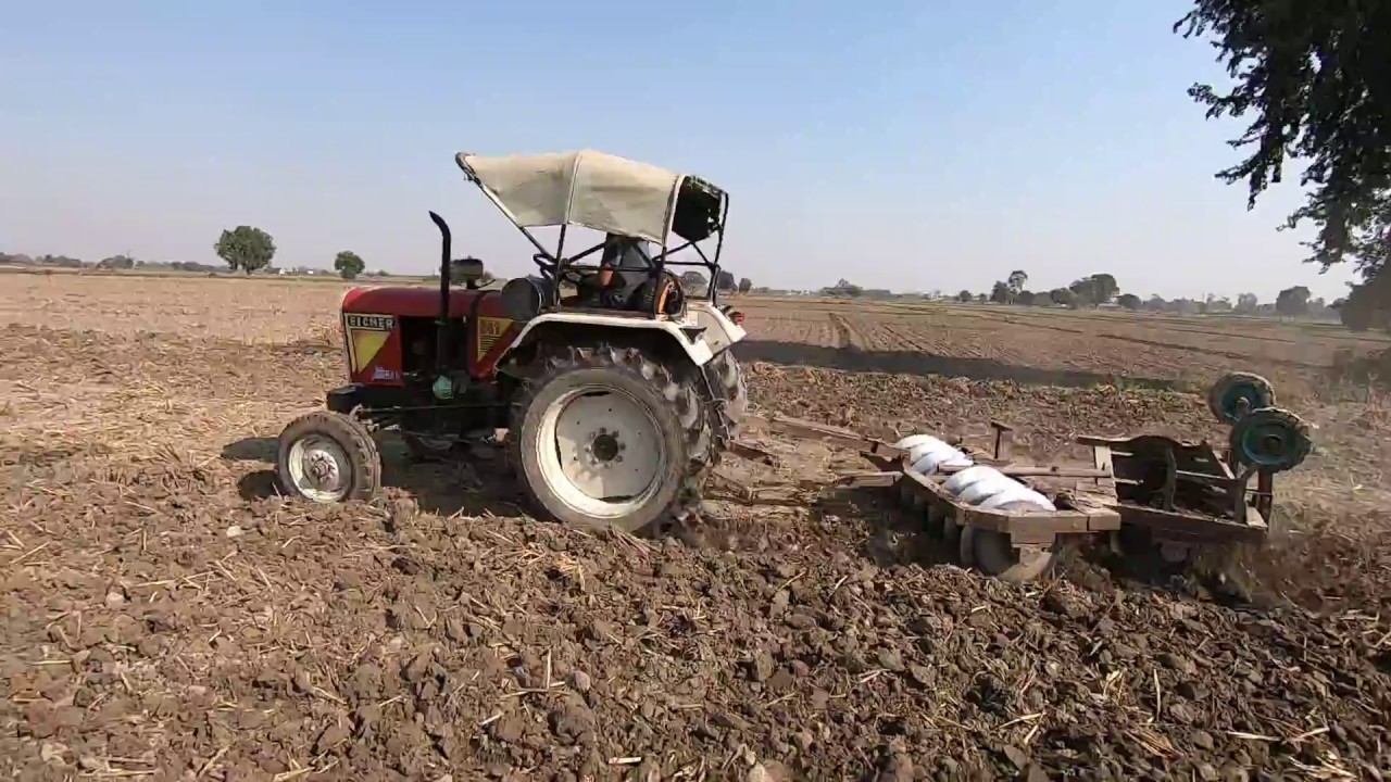 Eicher 241 tractor performance with harrow in the field