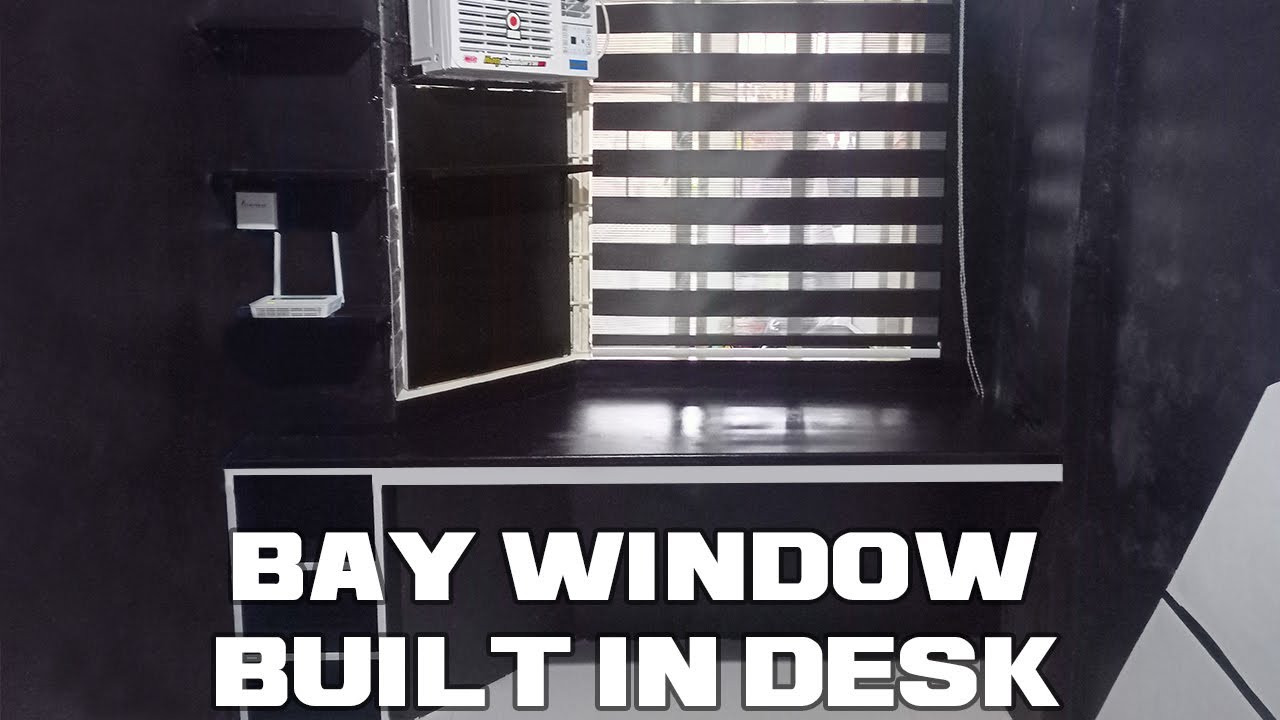 BUILT IN COMPUTER DESK W/ SHELVES (BAY WINDOW)