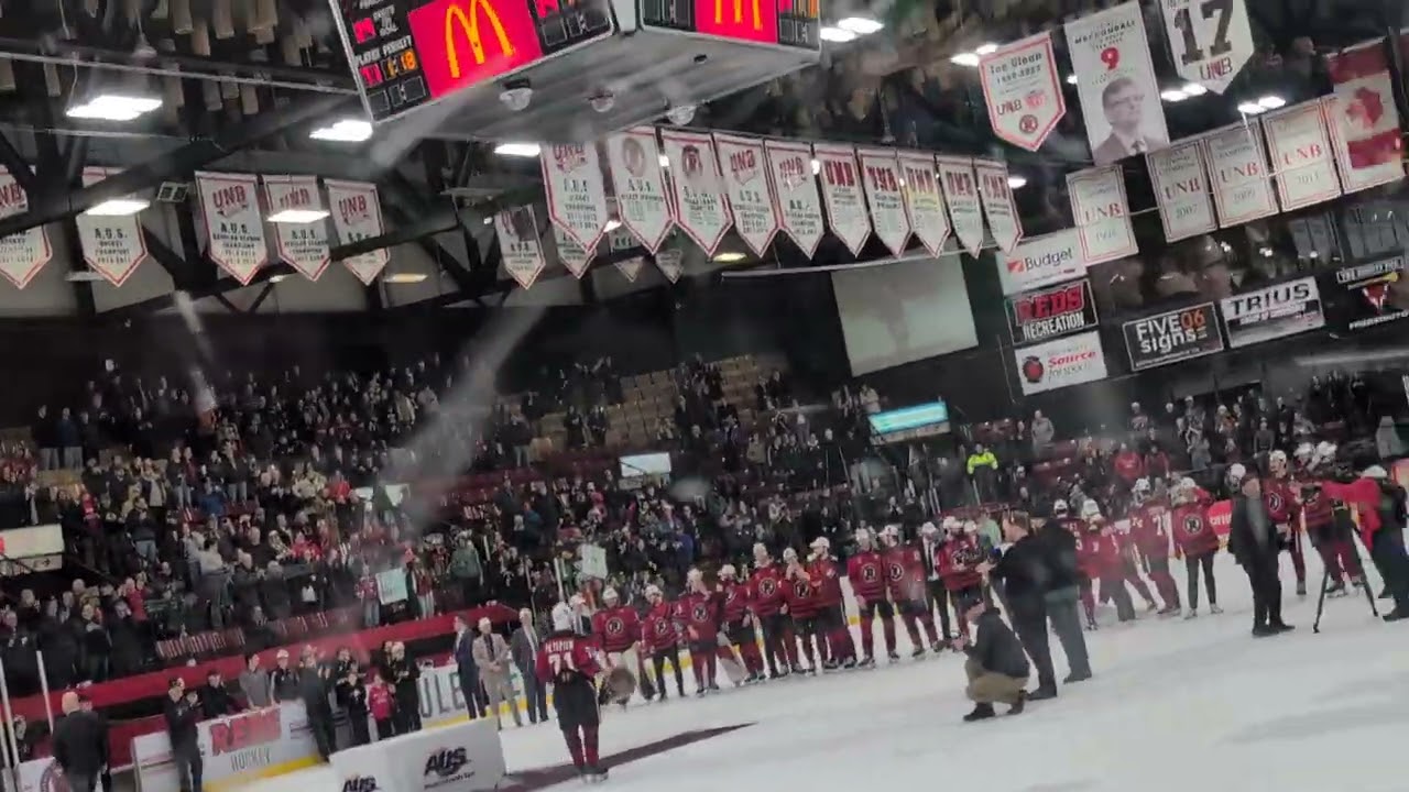 Trophy presentation UNB REDS MEN'S ICE HOCKEY TEAM is NOW 8 STRAIGHT AUS CHAMPIONS 