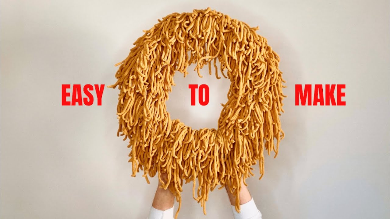 How To Make A Holiday Wreath With Some Yarn