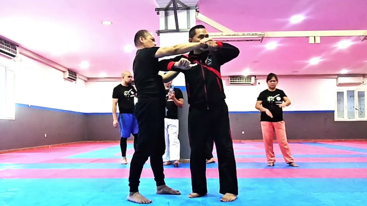 Filipino martial arts self defense training against knife attack 
