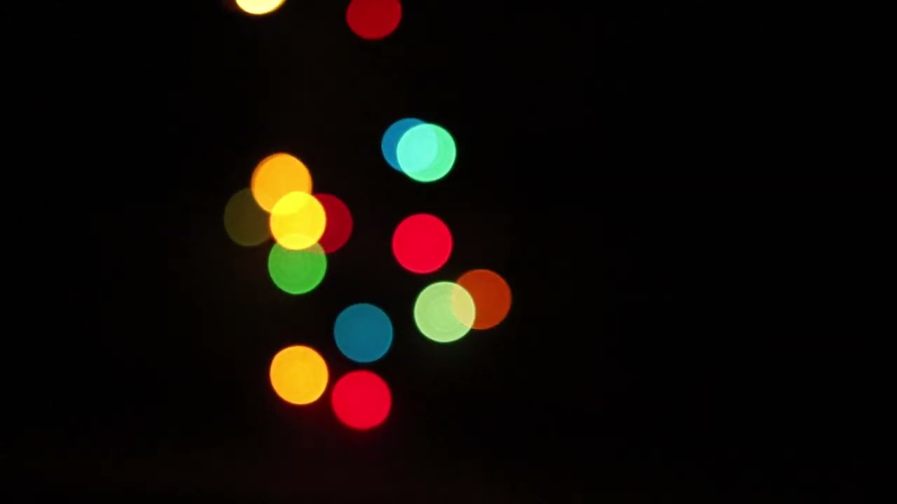 stock video full HD Falling christmas lights with bokeh in slow motion