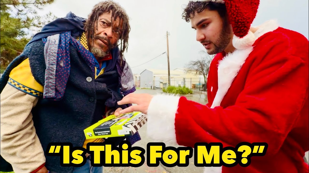 Santa Gives Presents To The Homeless!