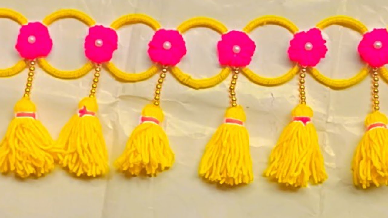Woolen toran design | Woolen flower door hanging | Woolen craft ideas | New wall hanging design wool