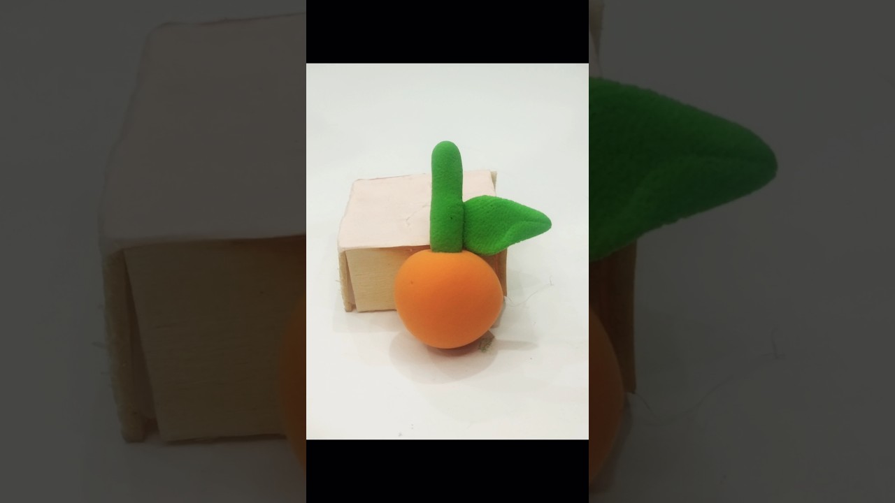 makeing little orange 🍊 with clay 