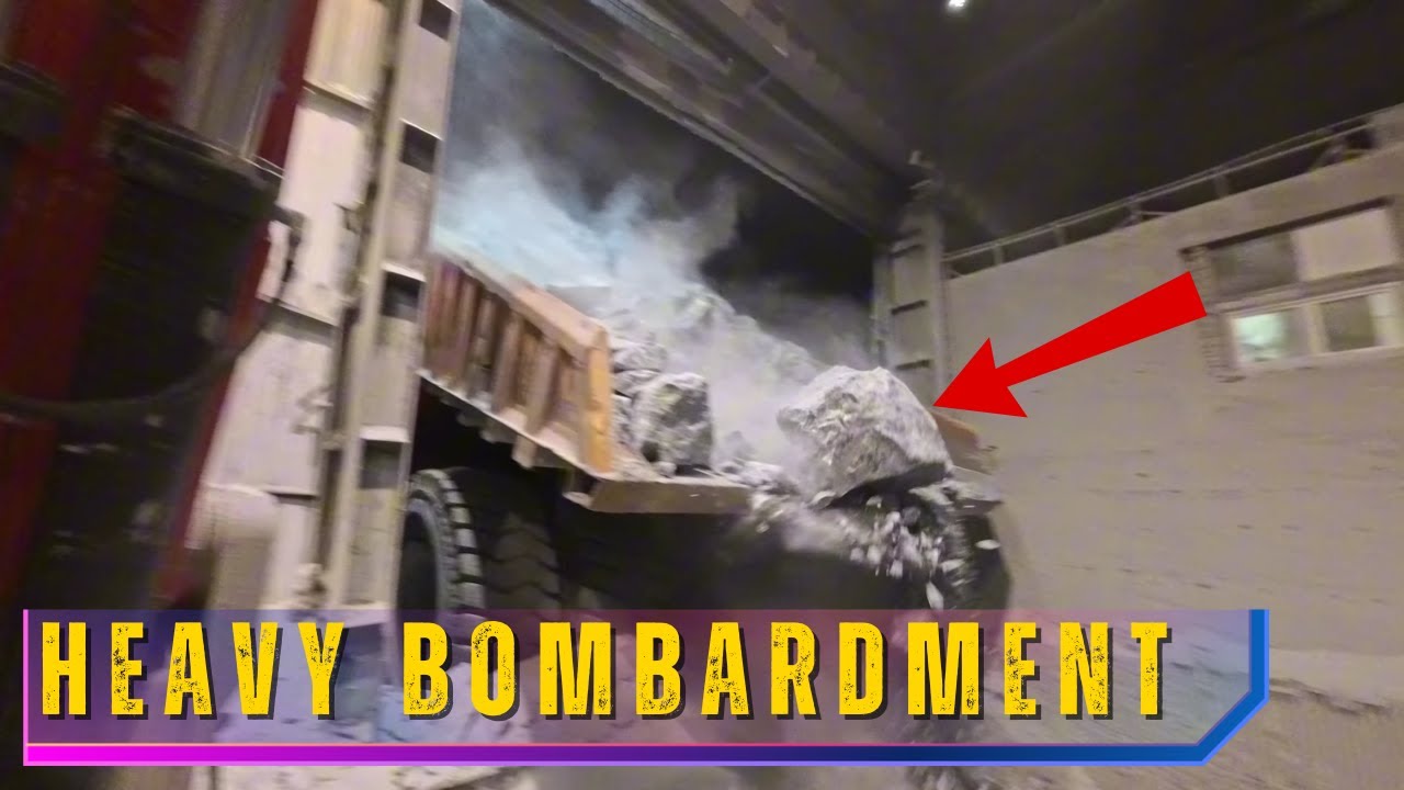 Heavy and Constant Bombardment of the Crusher with Big Boulders from Trucks