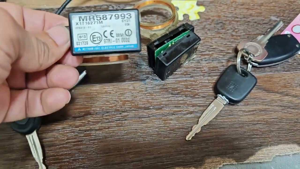 Mitsubishi Lancer 2005 immobilizer box replacement MR587993 تغيير ايموبليزر ميتسوبيشي لانسر