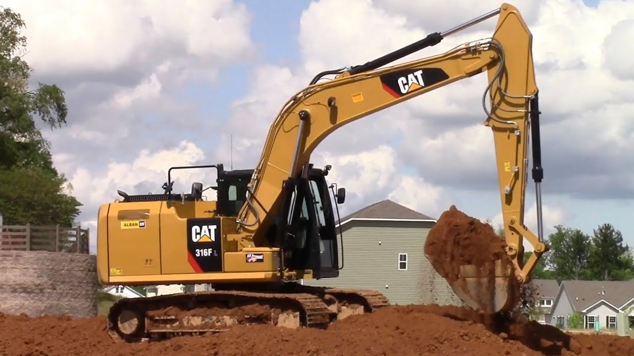 CAT 316F Excavator Moving Dirt