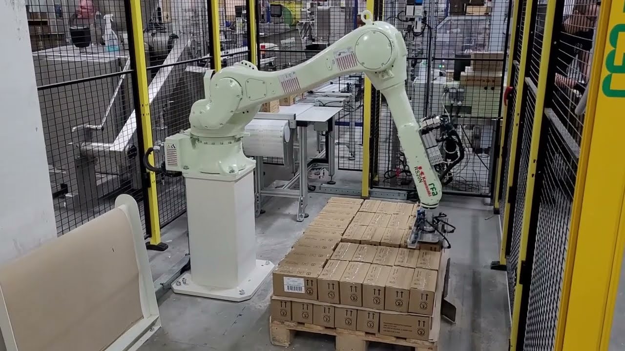 Kawasaki Robotics: palletizing of boxes with clay.