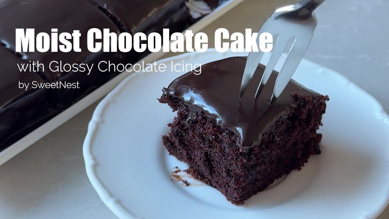 Moist Chocolate Cake with Glossy Chocolate Icing - it's the yummiest chocolate cake out there!