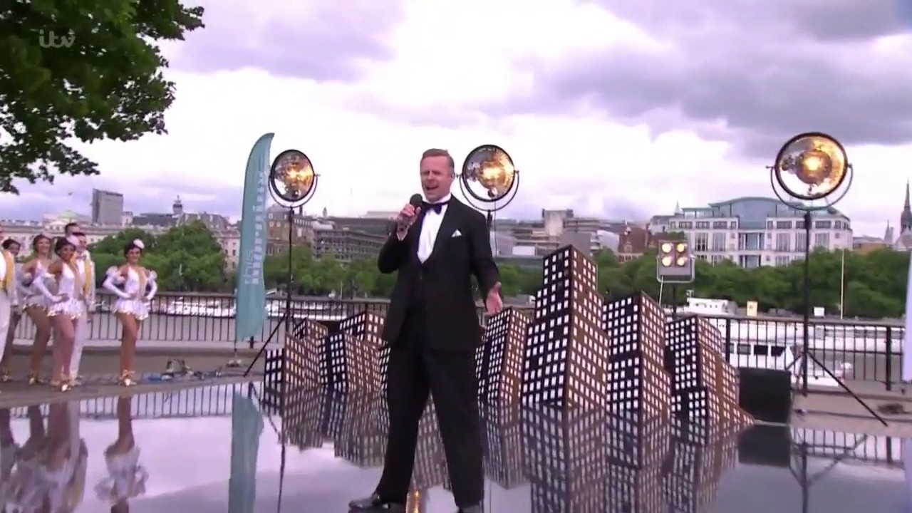 a mini video clip of Tom Lister singing