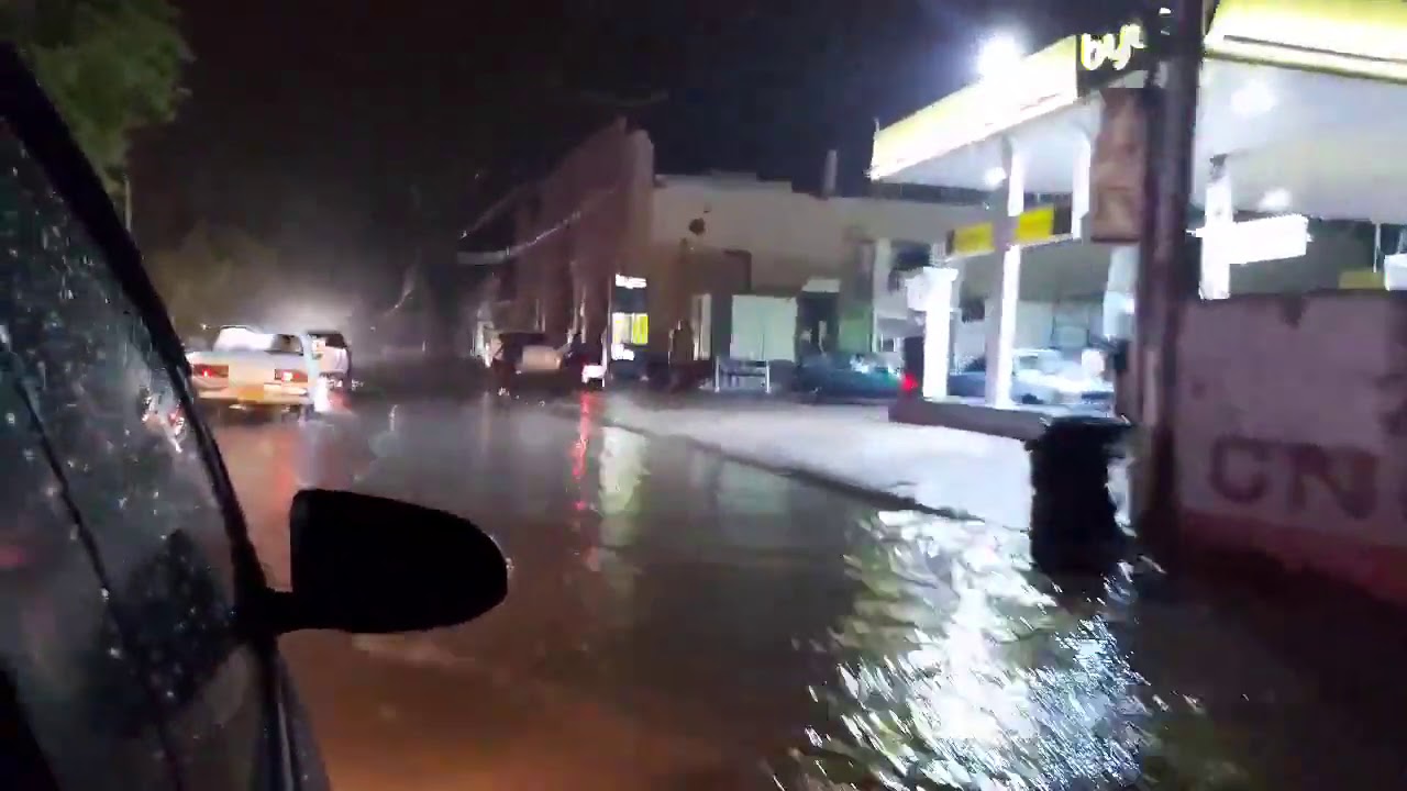 KHAYBAN E ITTEHAD & ABU AL HASAN ISPHAHANI ROAD KARACHI -BLACK & WHITE VIEWS - HEAVY RAIN STUCK LIFE