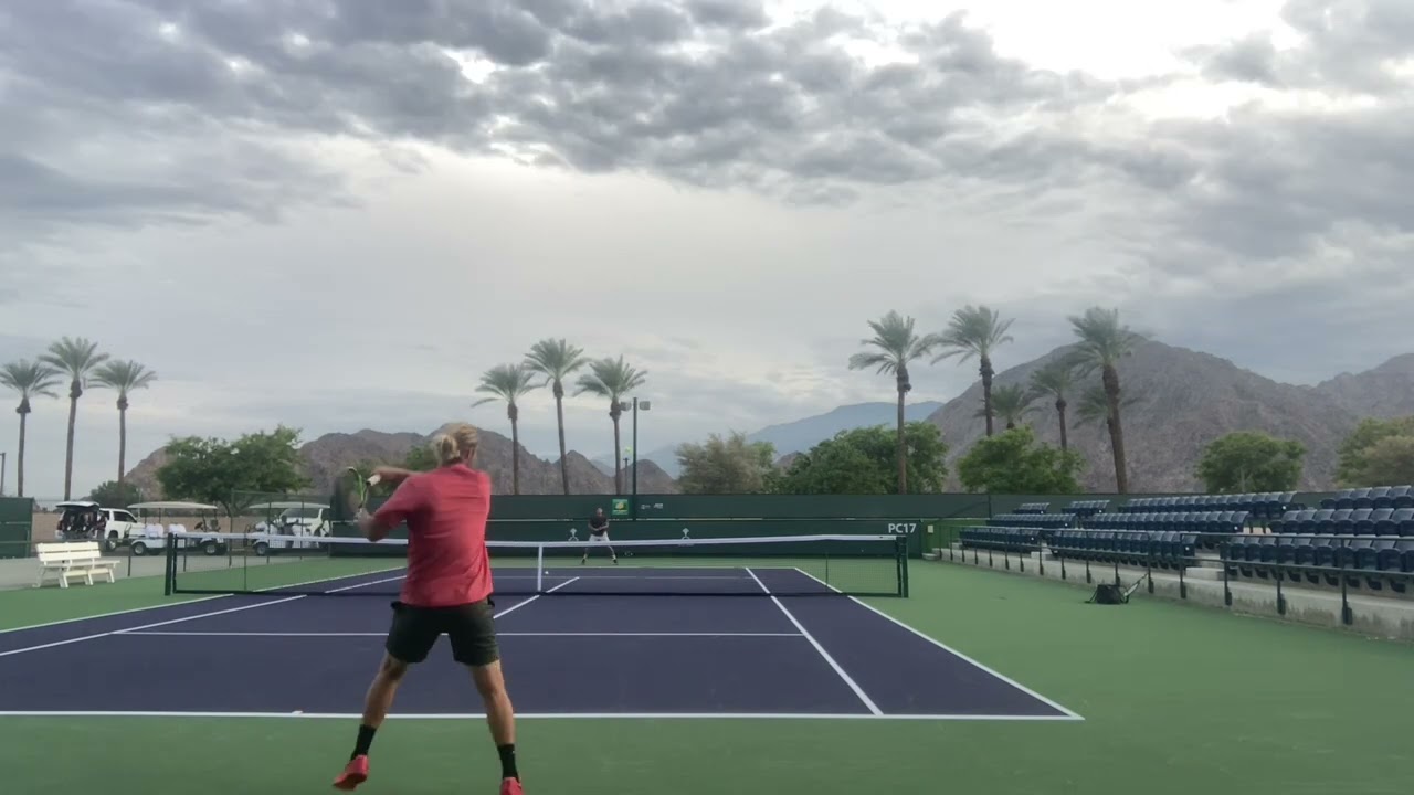 Hit with former ATP #20 Dmitry Tursunov
