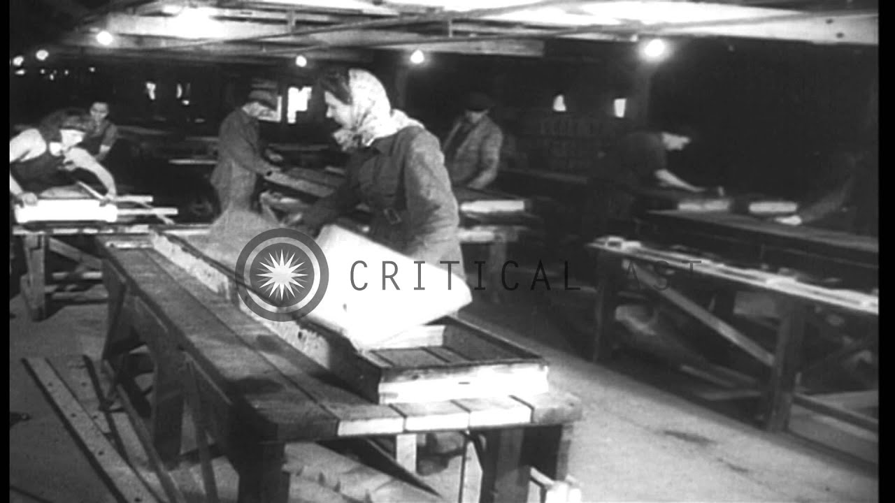 Men and women construct new houses after World War II. HD Stock Footage