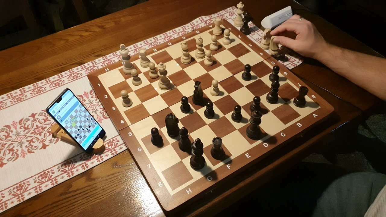 Dine & Play: iChessOne's Online Game on Lichess.org in a Restaurant