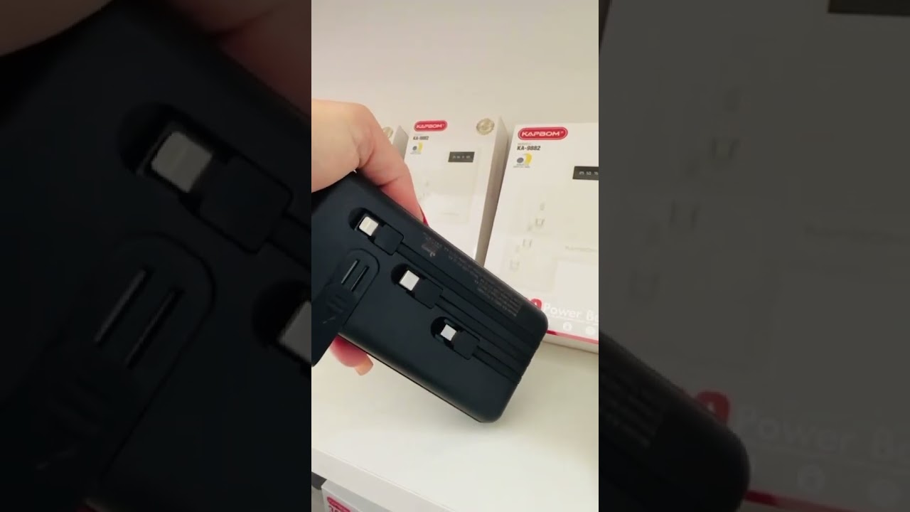 Carregador Port&aacute;til Kapbom 20.000 mah com cabos embutidos KA-9882