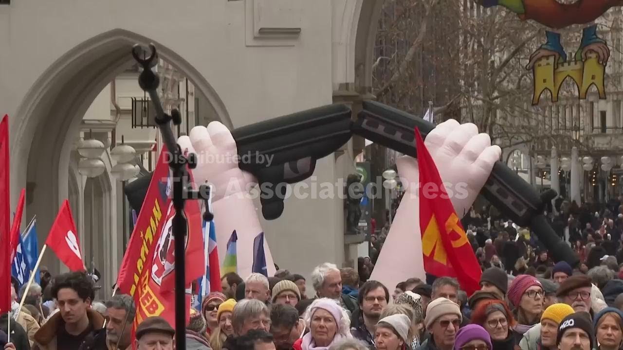 Thousands in Munich call for defence budgets to be slashed