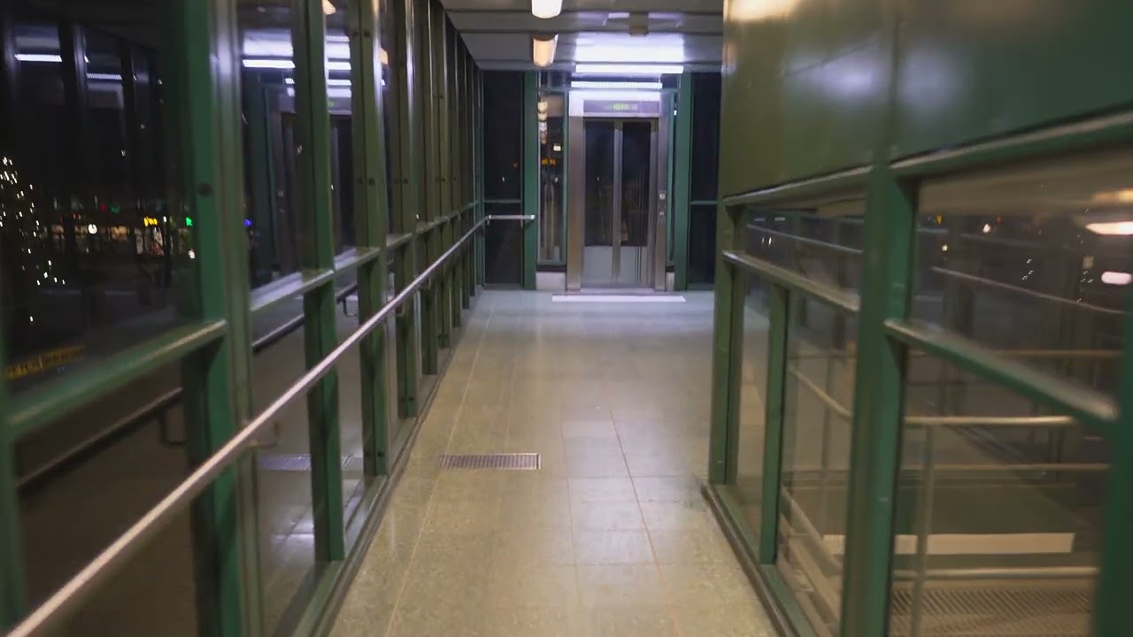 Sweden, Stockholm, Bandhagen Subway Station, 1X escalator, 1X elevator @ night