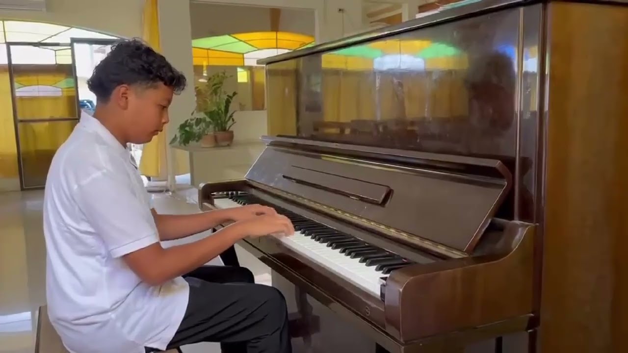 Desmond C. Atun, 13 years old Suzuki Book 2 