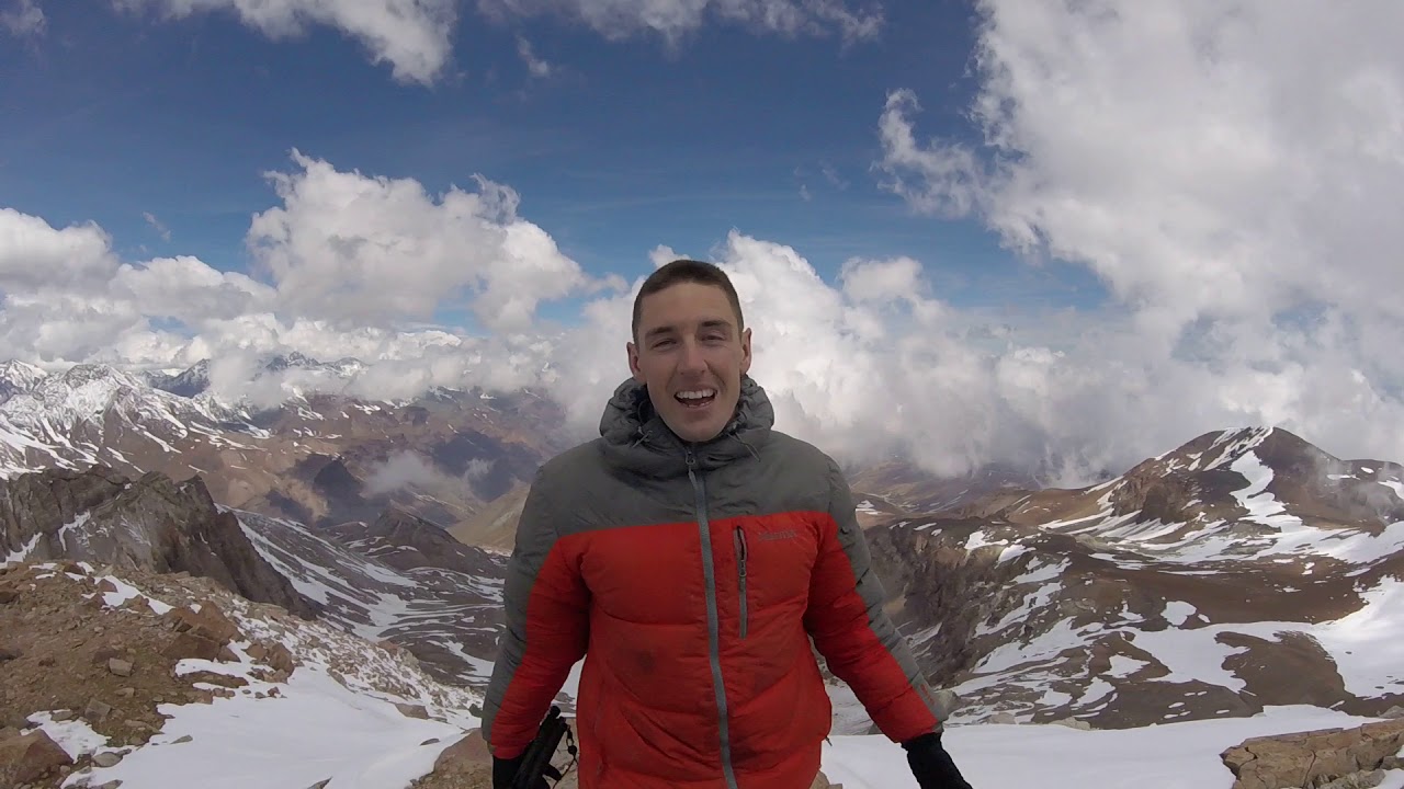 Happy client to reach the summit of Cerro Pintor 4.180 m. Andes mountain range, Chile.