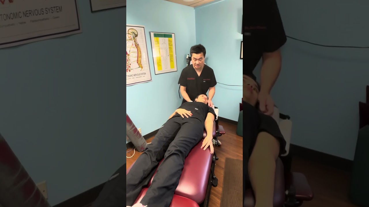 Applied Kinesiology adjustment on her Upper Back Pain.