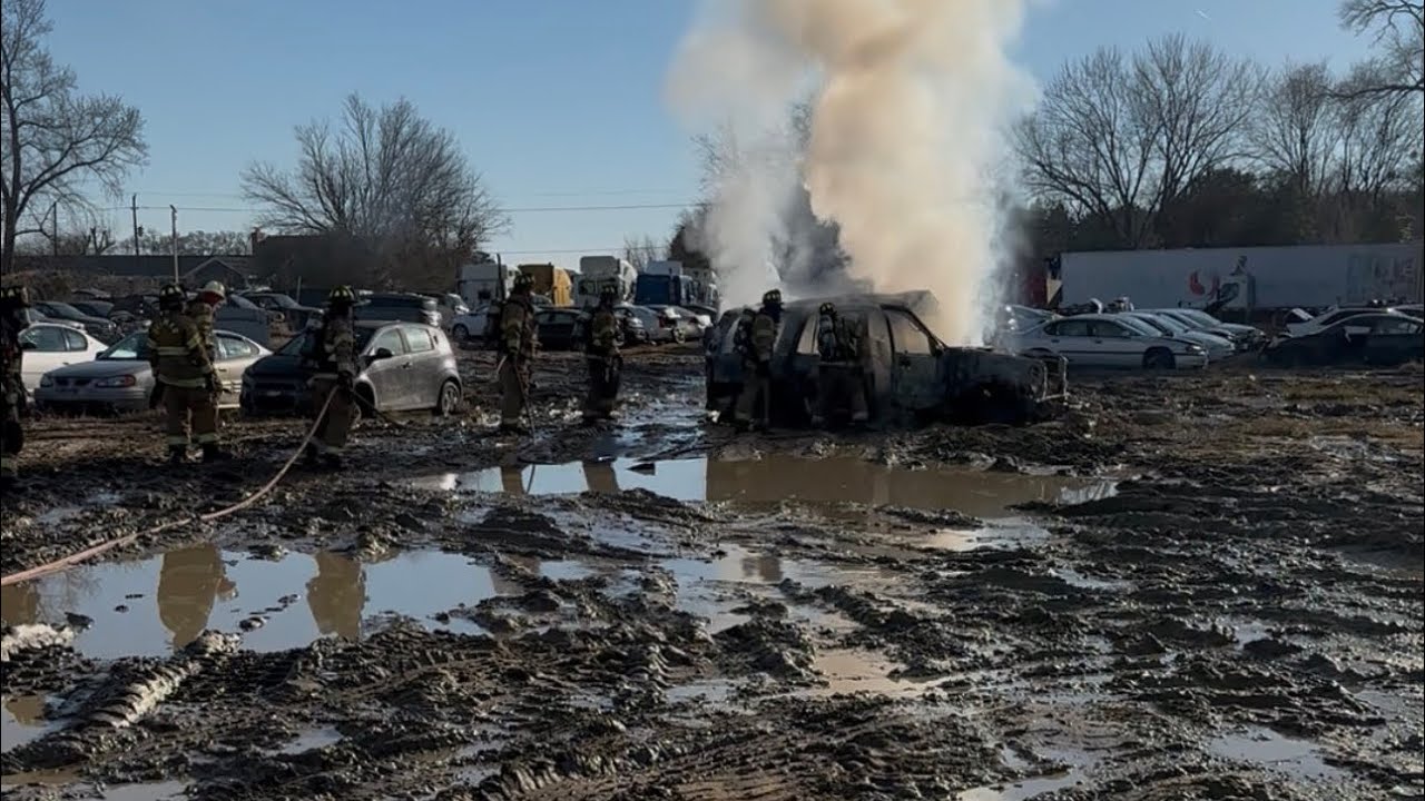 Engine 74-1 responds to a Junkyard car fire