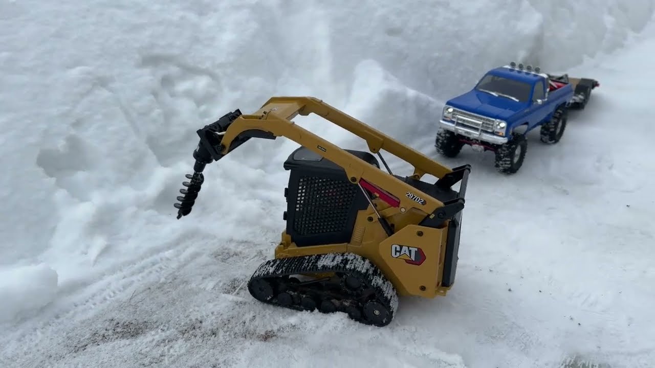 Pushing snow and auger test, RC skid loader CAT 297D2, Chevy K10 Trx4m