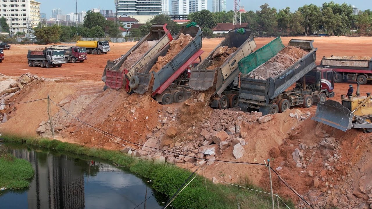 Wonderful! Huge Project Land Filling Heavy Dump Truck Dumping Soil & Rock, Bulldozer Pus Moving