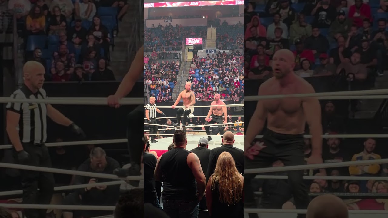 Moxley whips Darby with belt 
