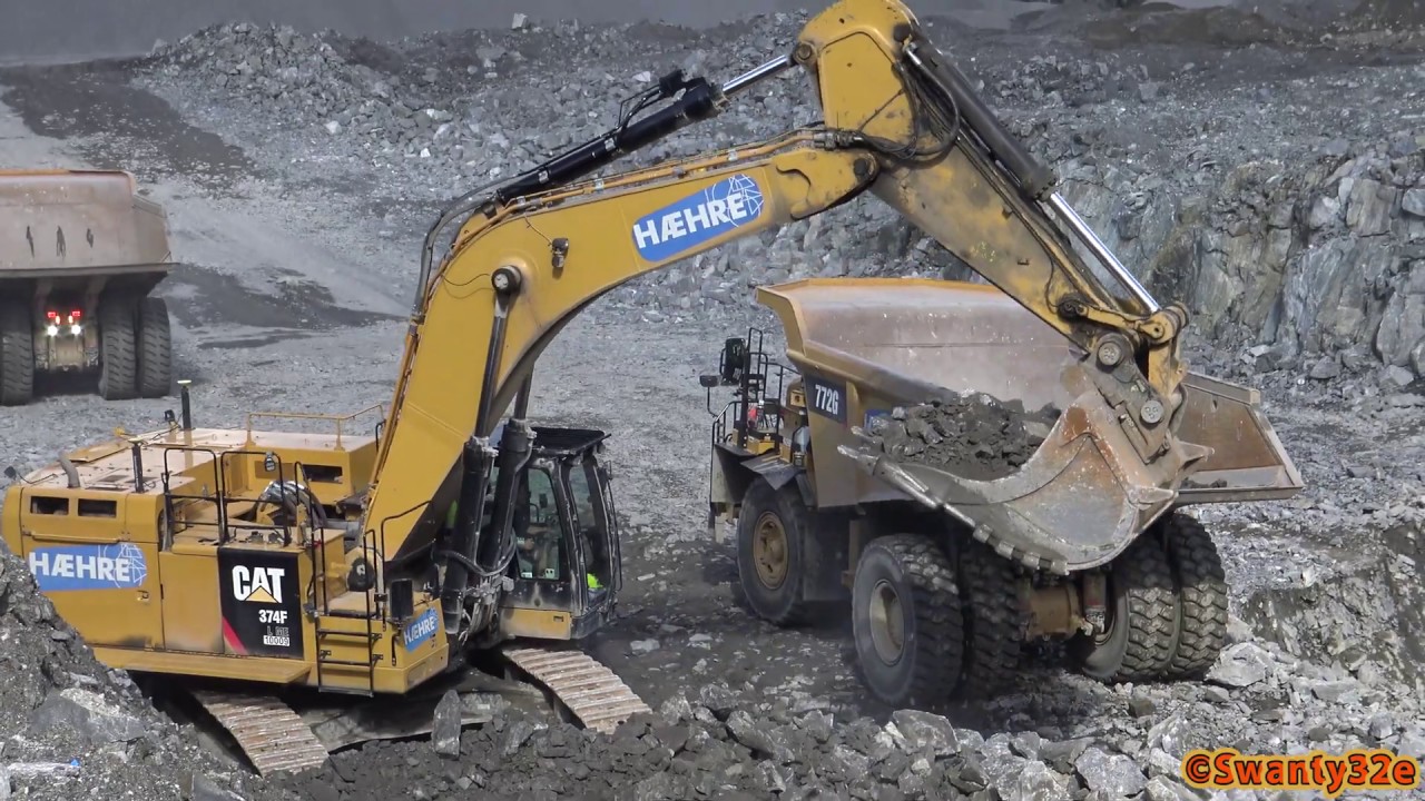 4K| CAT 374F LME Excavator Loading CAT 772G Dumpers