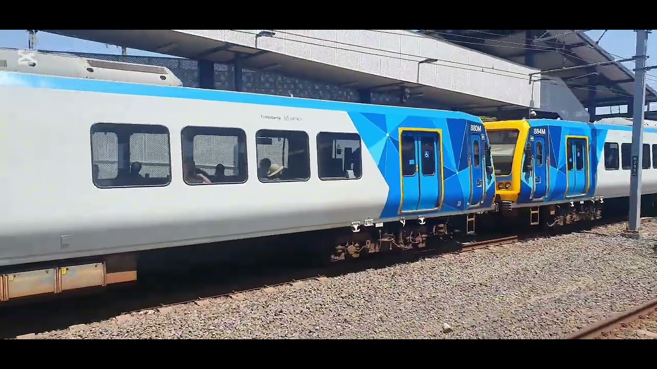 Trains at Blackburn and Ringwood train station 