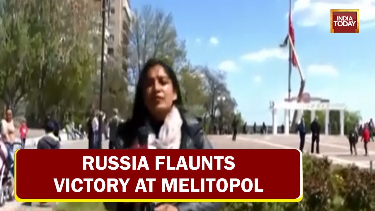 Red Soviet Victory Flag With Russian Flag, Russia Flaunts Victory In Melitopol | Ground Report