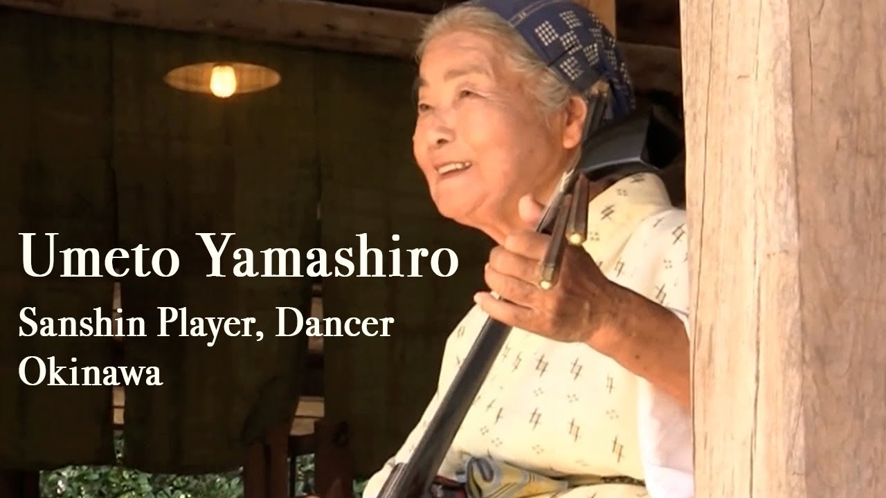 Umeto Yamashiro, Sanshin player, Dancer. In Okinawa Ryukyumura, Okinawa, at the age 90