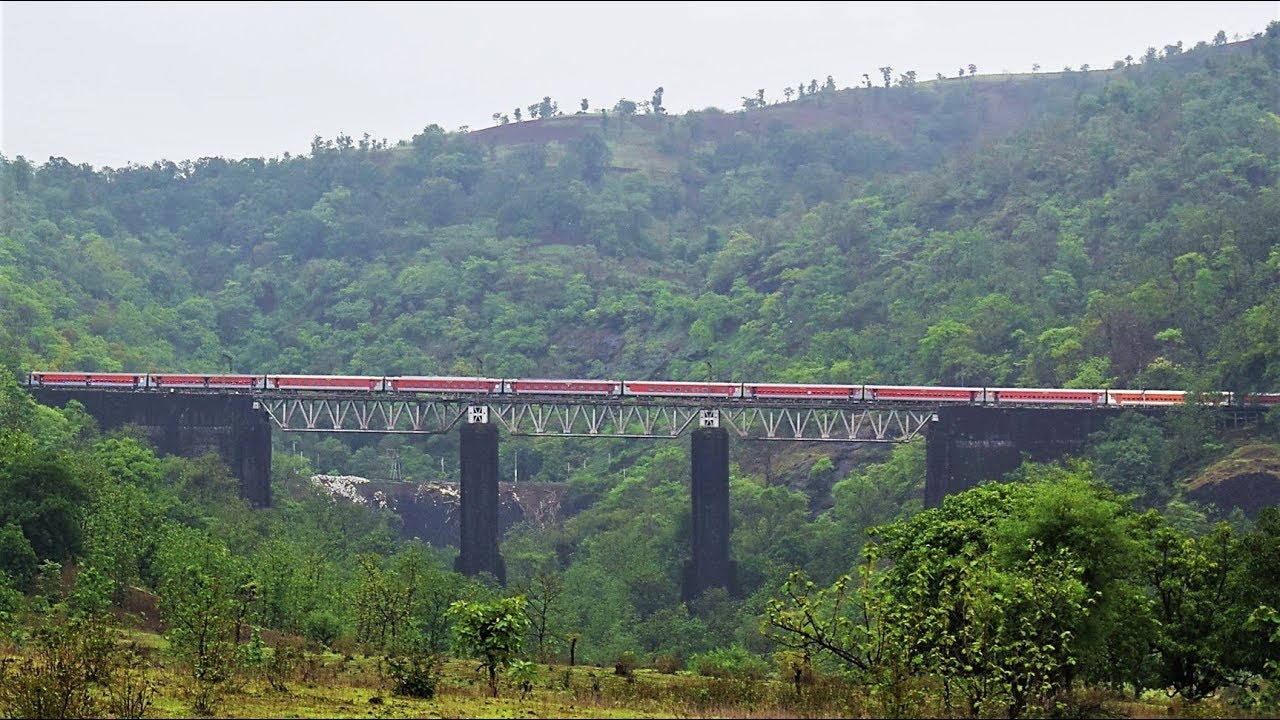 Spectacular setting captured from a remote location in the ghats - Uniform LHB Pawan Express