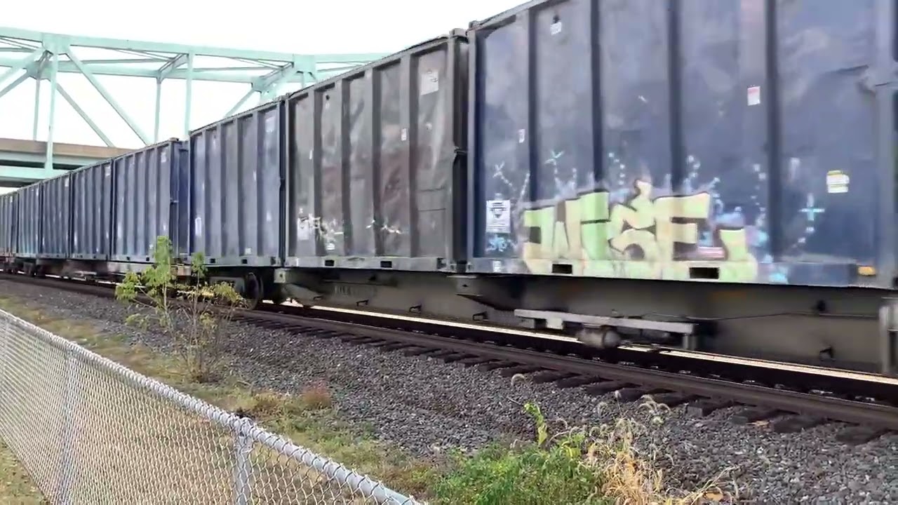 Westbound Trash train races a westbound Hopper train in sewickley pa