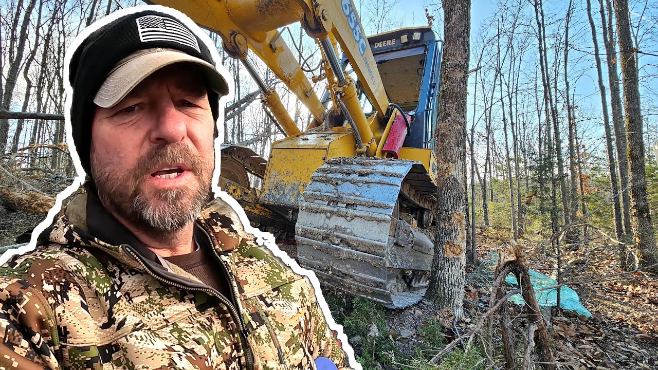 Retired Cop owns the Land-Clearing land with the John Deere Crawler at Project 205