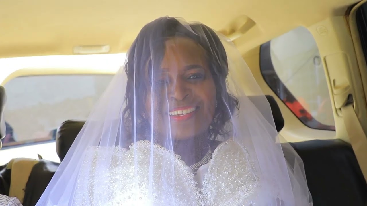 RHODA WEDS DAN AT ST  BENEDICT CATHOLIC CHURCH KAVETA