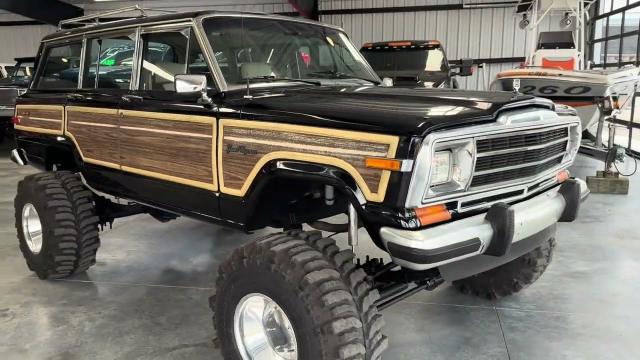 1of2 crazy Grand Wagoneer lifted classic suvs for sale this one super wide on boggers Dana 60 4x4