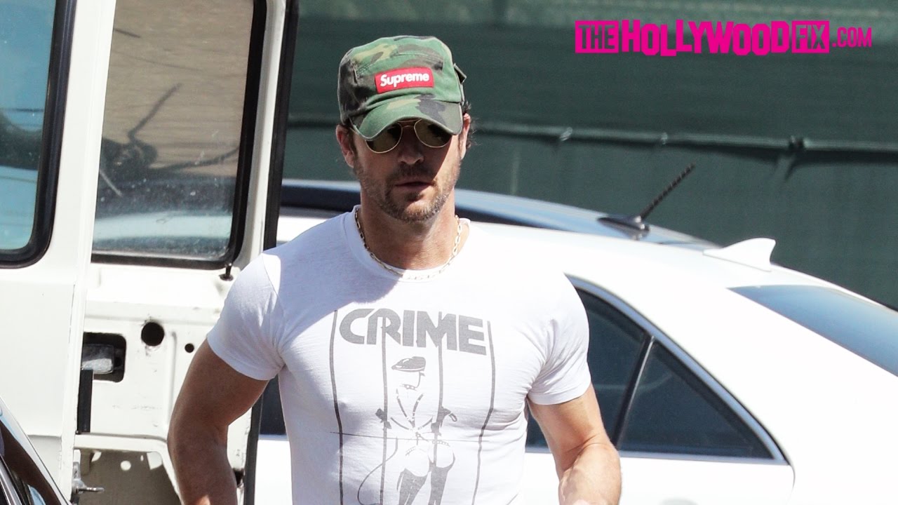 Justin Theroux Wears A Supreme Hat & Balmain Jeans While Leaving The Gym 3.27.17